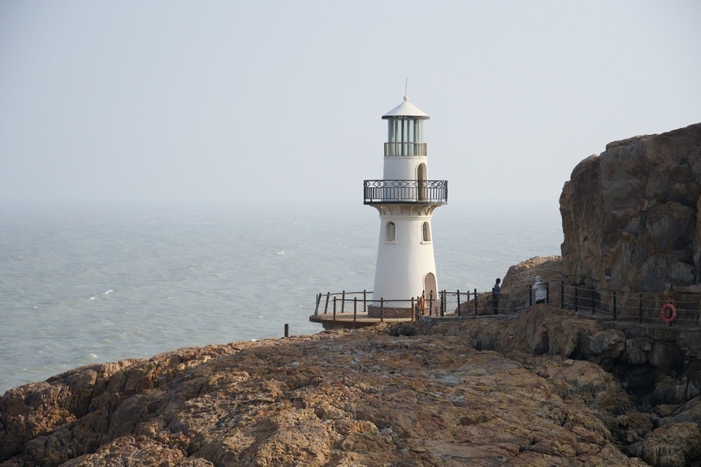 Lighthouse by the sea at the start of 2024
